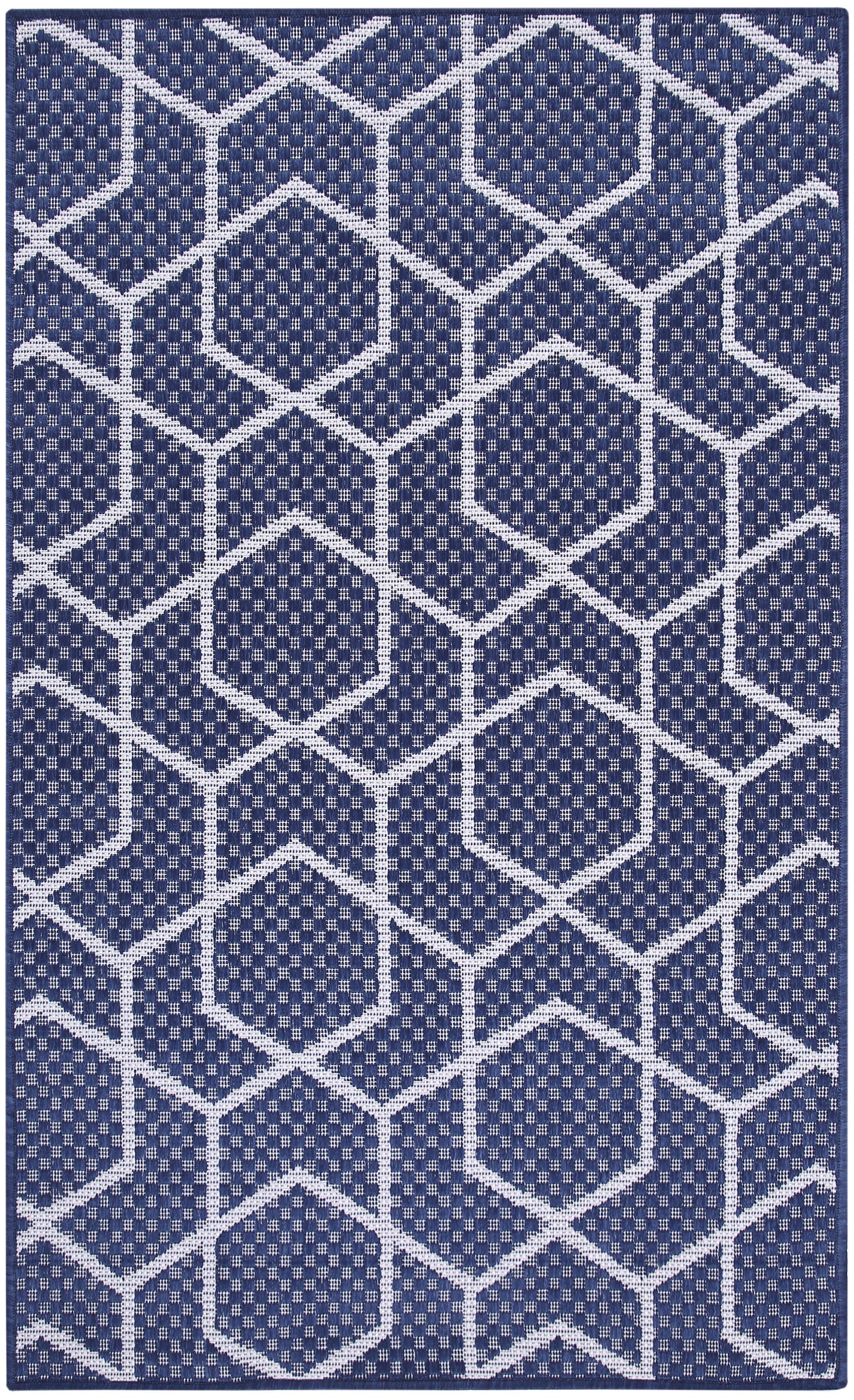 Navy blue rectangular rug with white geometric hex pattern; woven texture, modern floor decor.