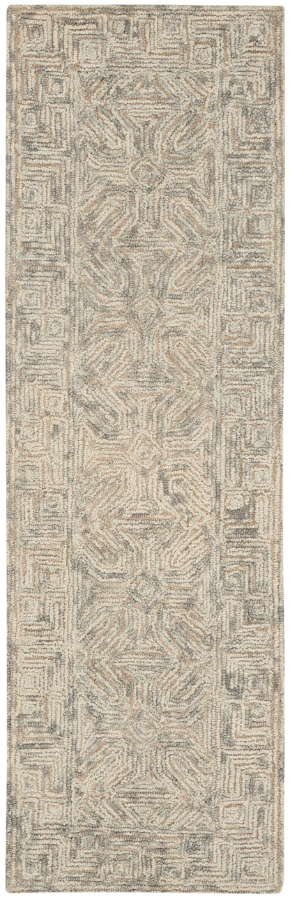 Soft tufted shag rug runner in ivory-beige-gray with a geometric center motif and intricate border.
