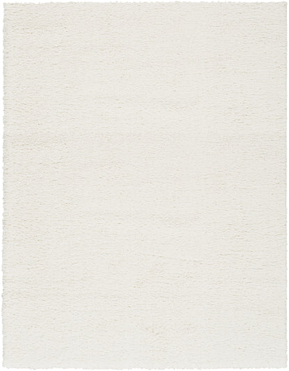 Cream textured shag rug with soft ivory pile and ragged edges; ideal for living room or bedroom.