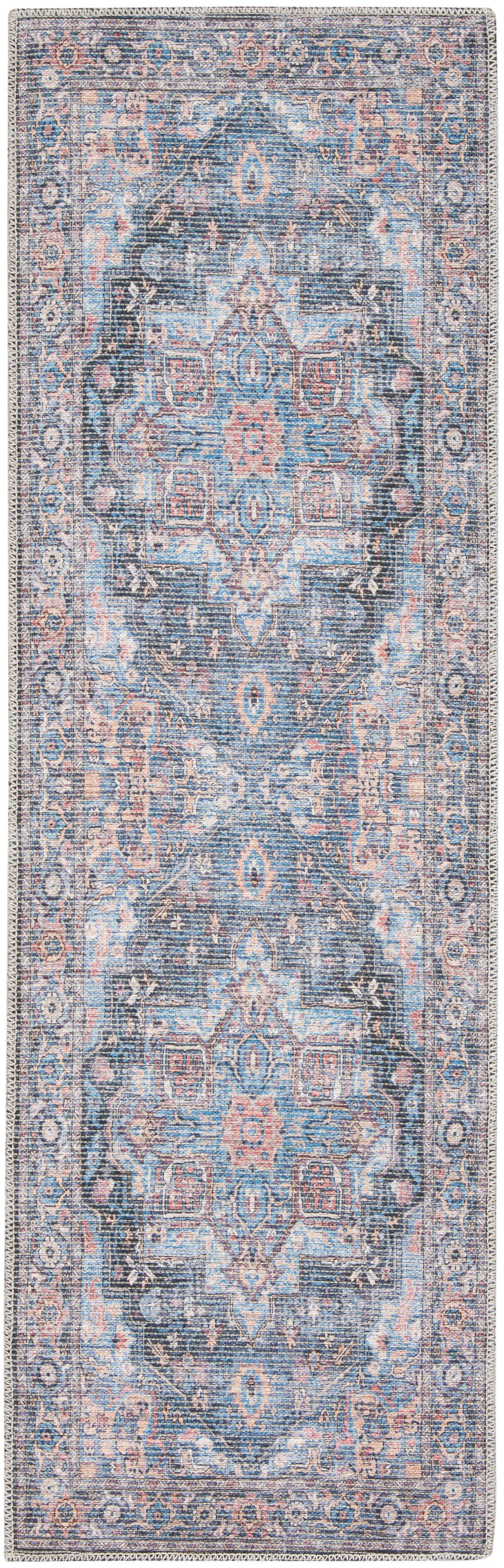 Distressed blue oriental runner rug with central medallion and pink accents, ornate borders.
