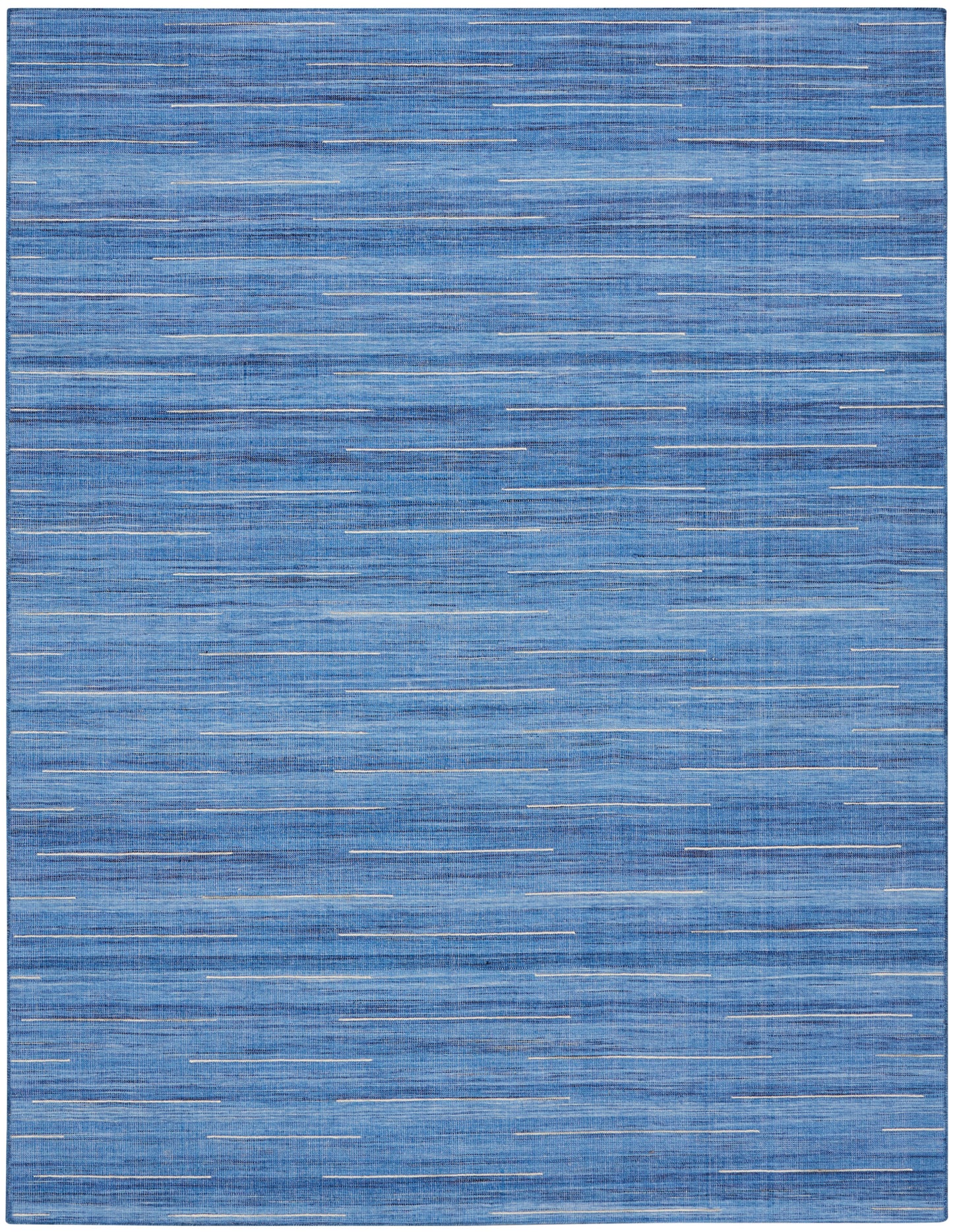 Blue flat-weave rug with subtle white dashed lines; rectangular, modern, versatile for living rooms.
