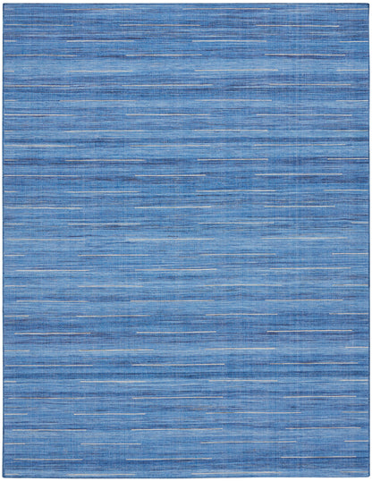 Blue flat-weave rug with subtle white dashed lines; rectangular, modern, versatile for living rooms.