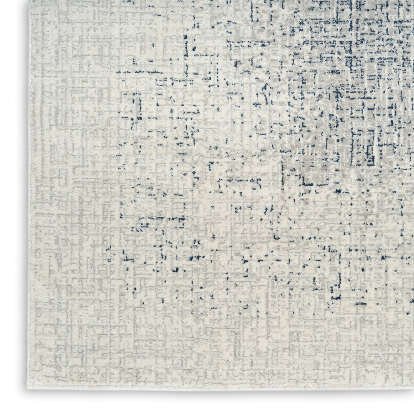 Cream textured area rug with subtle blue-gray geometric grid; modern, soft floor decor.