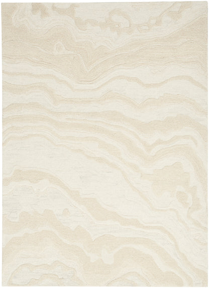 Soft beige area rug with cream marbled wavy pattern and a textured surface.