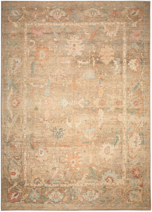 Rectangular beige vintage oriental area rug with faded floral motifs in ivory, pale blue and coral.