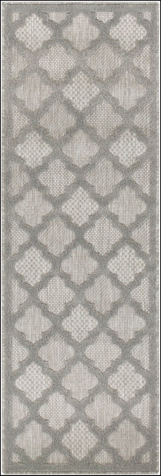 Gray toned outdoor runner rug with an interlocking diamond lattice pattern in beige and a soft fringe border.