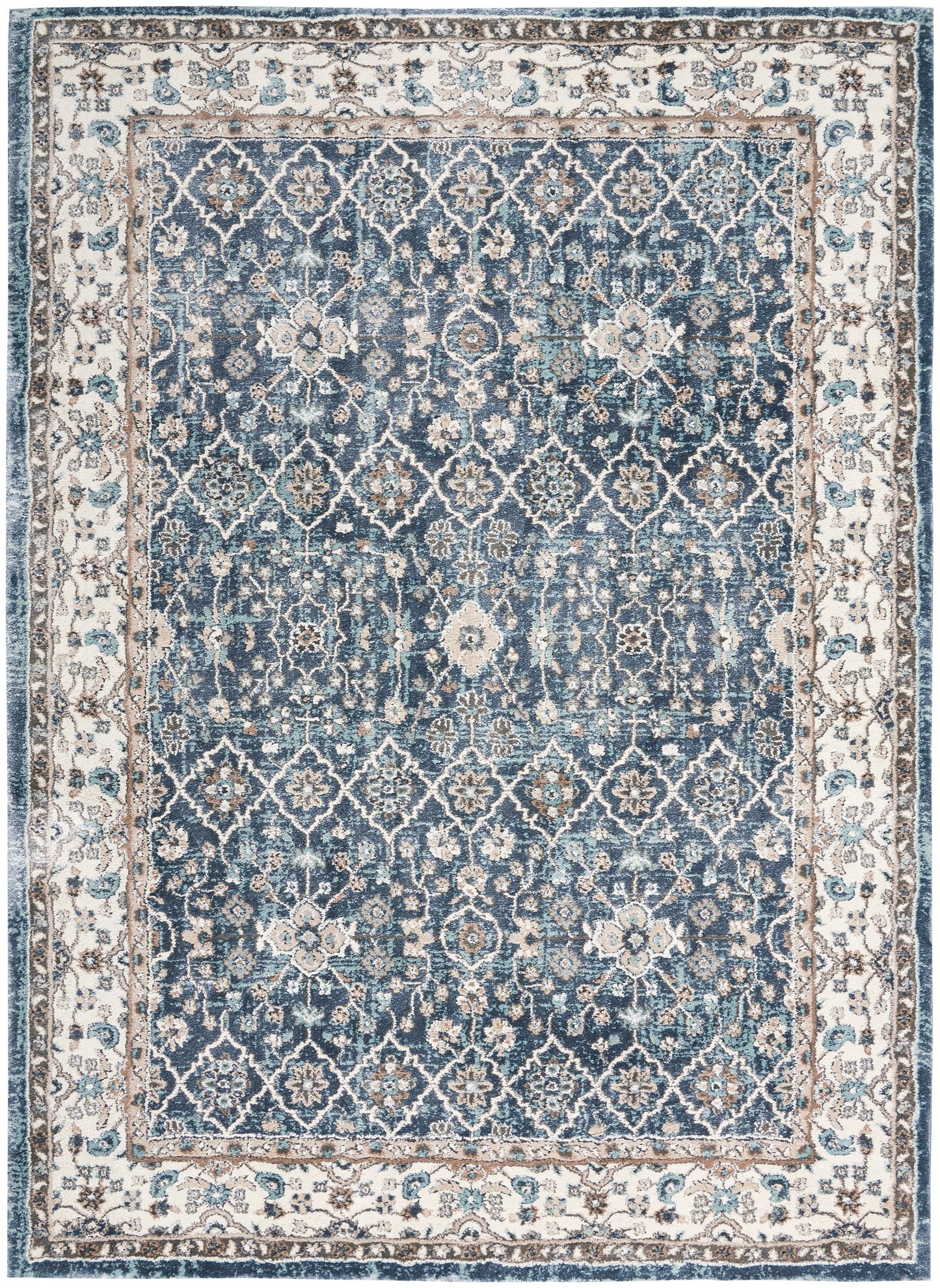 Blue Persian-style area rug with ivory border and intricate floral lattice pattern; vintage distressed look.