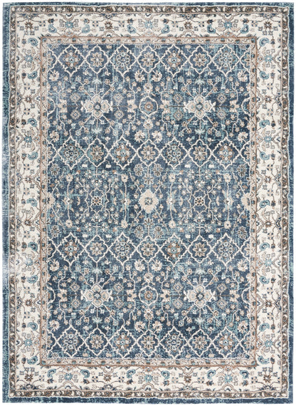 Blue Persian-style area rug with ivory border and intricate floral lattice pattern; vintage distressed look.