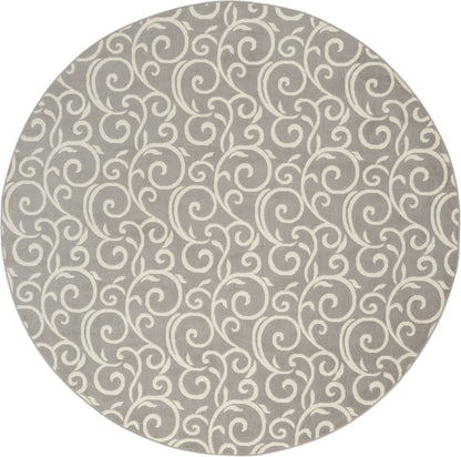 Round taupe rug with cream swirling scroll pattern; soft, durable decorative floor covering.