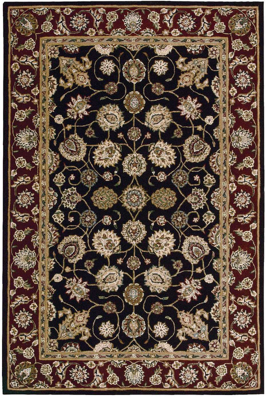 Decorative Persian-style oriental rug with black field, gold and cream floral motifs, and burgundy border.