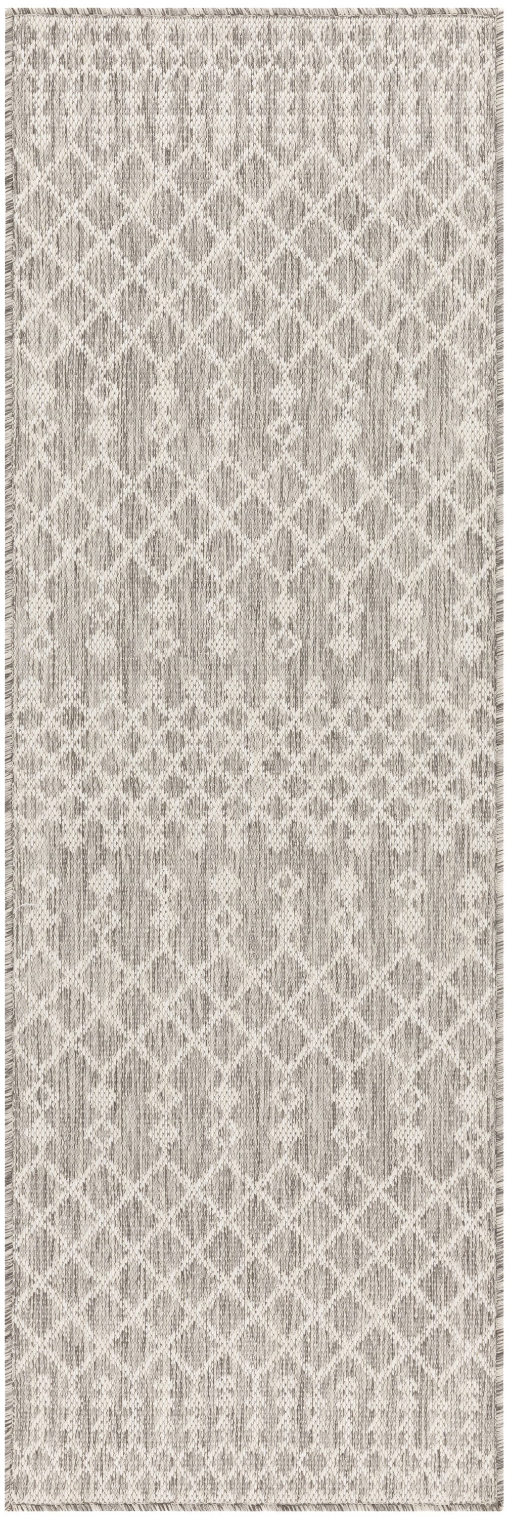 Neutral gray and ivory runner rug featuring a diamond lattice pattern and fringed ends.