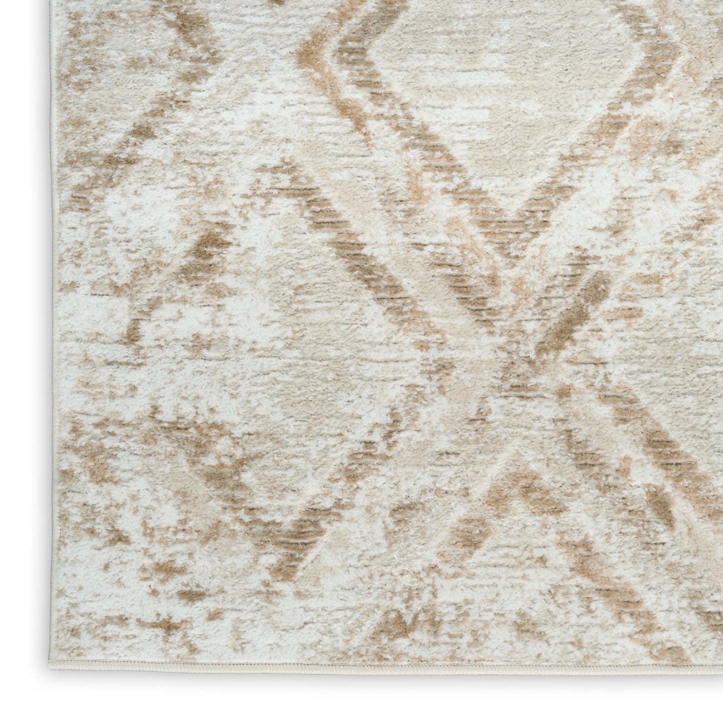 Beige and ivory geometric rug with diamond motif and plush textured pile for a neutral home decor look.