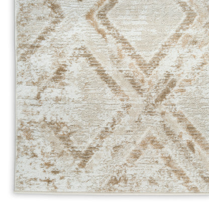 Beige and ivory geometric rug with diamond motif and plush textured pile for a neutral home decor look.