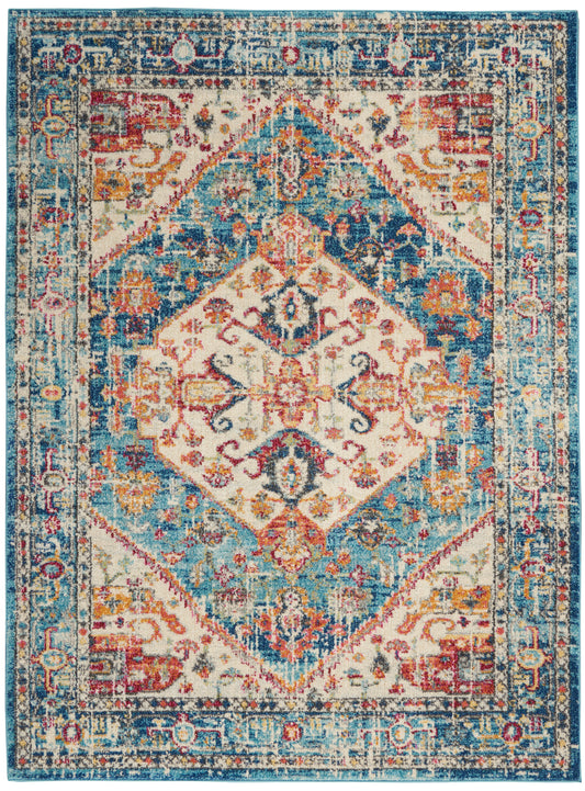 Colorful Persian-inspired area rug with teal border and ivory central diamond medallion; blue, pink, yellow floral motifs.