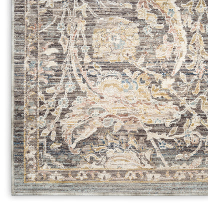 Taupe-gray oriental rug with ivory floral motifs, pale blue and gold accents, bordered edge in a traditional weave.