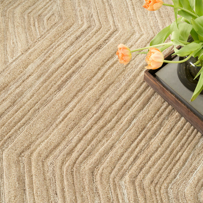 Beige textured area rug with wavy chevron pattern; dark wooden tray with orange tulips.
