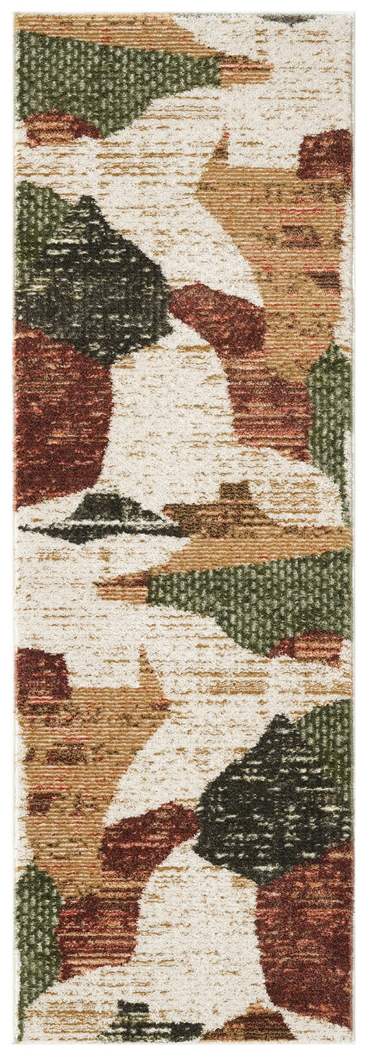 Narrow abstract patchwork runner rug with cream base and green, rust, tan, and black blocks; woven textured.