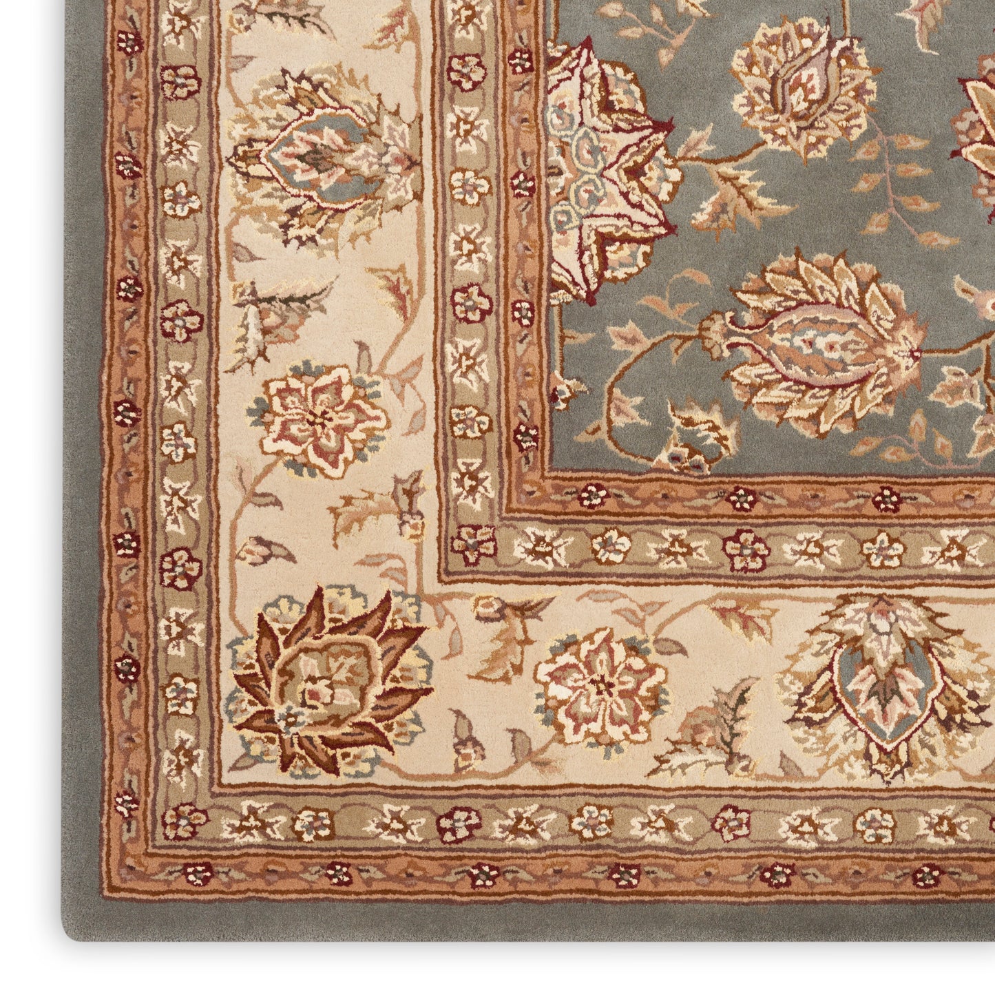 Traditional Persian-style area rug with beige border, ivory and blue-green field, and red-brown floral motifs.