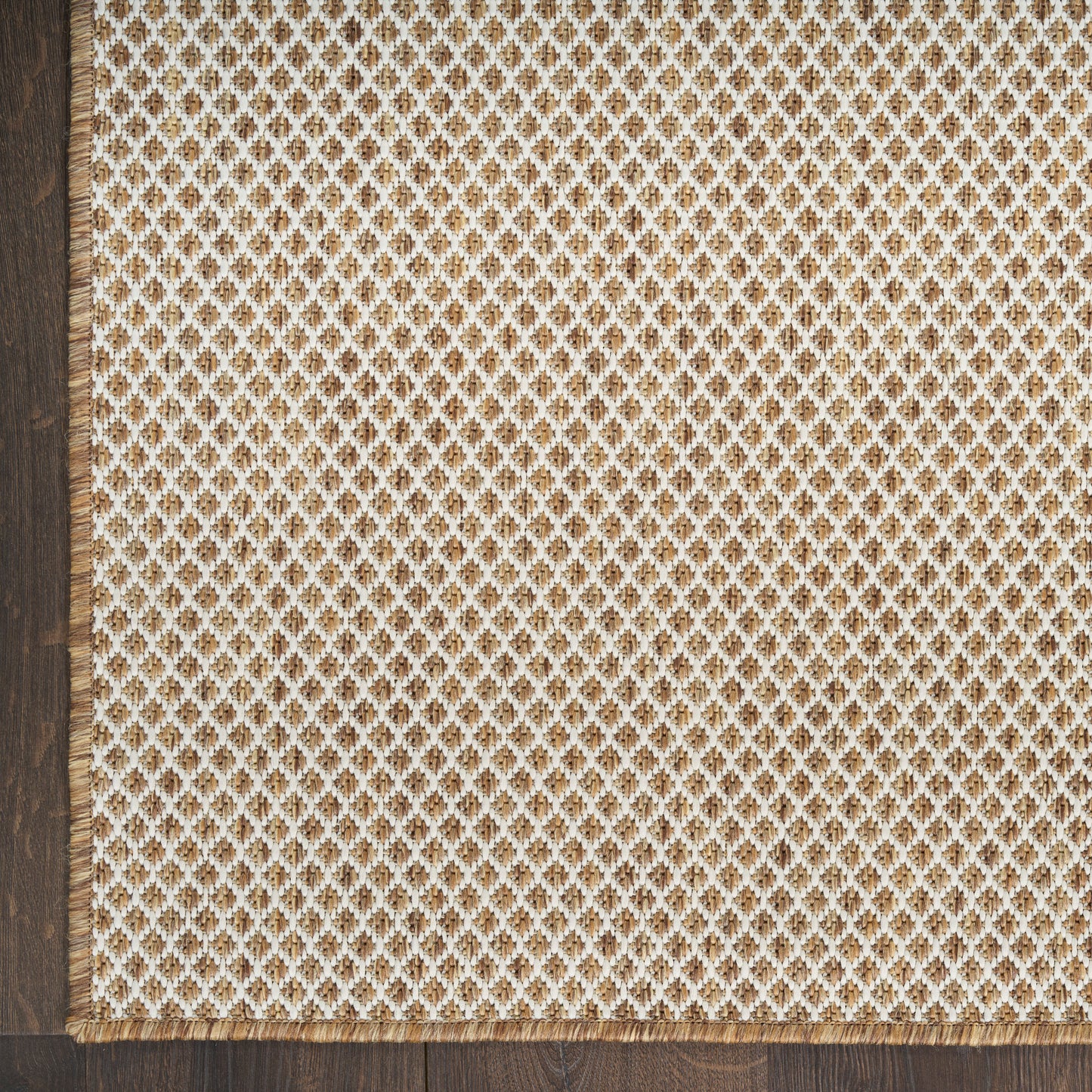 Beige linen textile with white crocheted lace border along bottom; vintage-style table runner or decorative throw.