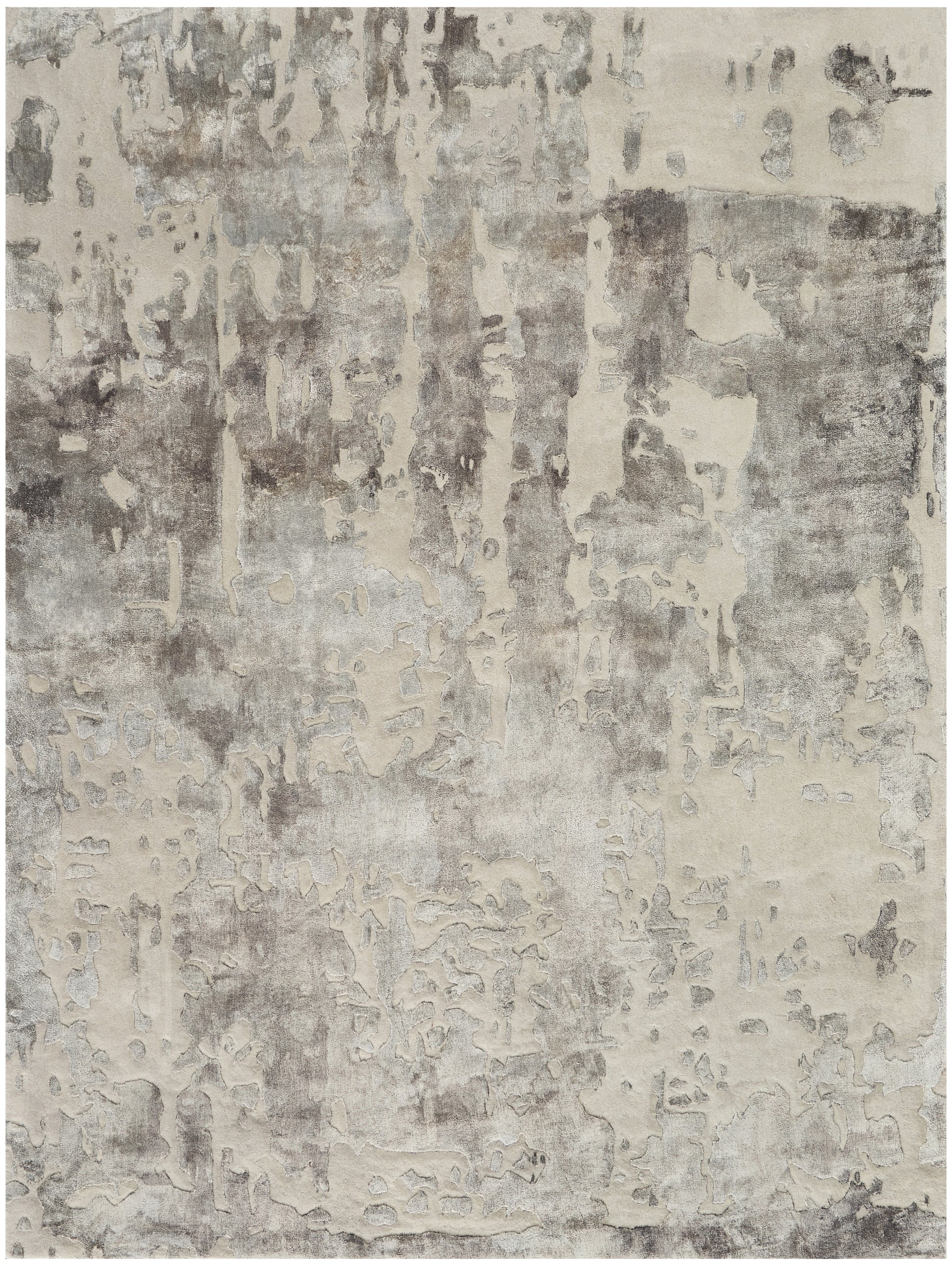Rectangular area rug with abstract distressed beige and gray patchwork, modern style.