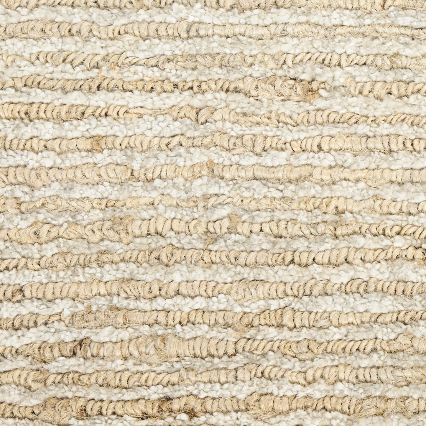 Natural beige jute rug with chunky looped texture; rustic woven floor covering for living room or entry.