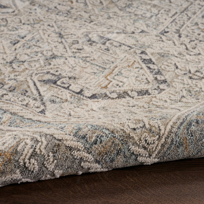 Soft ivory and blue-gray runner with an ornate Persian-style medallion pattern and plush pile on a wooden floor.