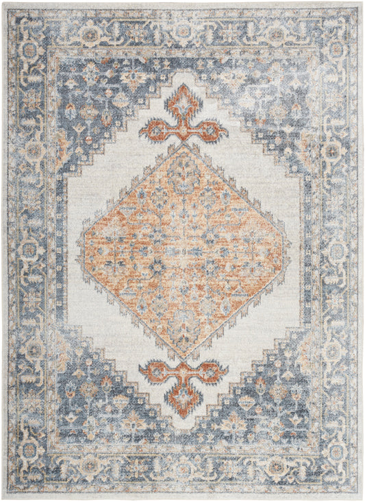 Persian-style area rug with blue-gray border, ivory field, and peach diamond medallion; distressed ornate pattern.