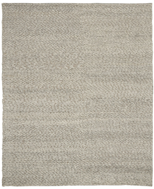 Beige boucle shag rug, rectangular, soft dense pile, neutral floor decor for living room.