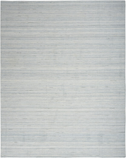 Light blue-gray woven area rug with subtle horizontal stripes; rectangular, modern minimalist style.