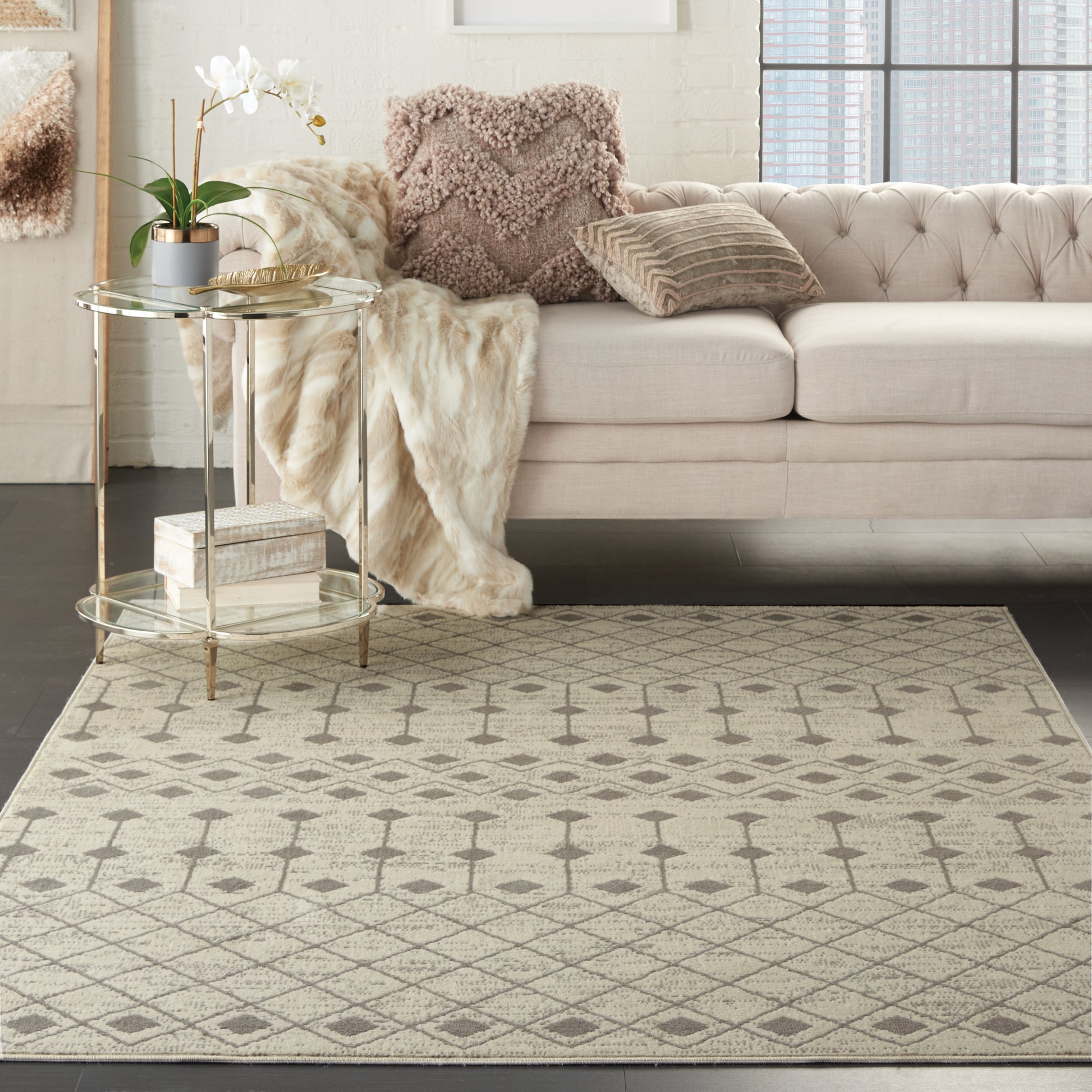 Geometric beige Bohemian rug, 4' x 6', on the floor.