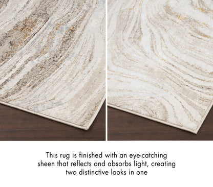 Cream and taupe swirled rug with edge binding on wood floor, featuring subtle light-reflective sheen.