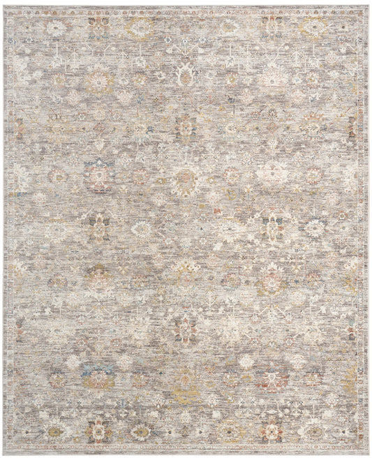 Muted gray-beige rug with faded oriental floral medallion pattern and subtle warm accents.
