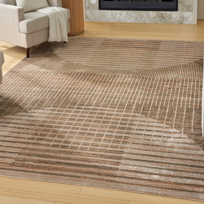 Brown and beige rectangular area rug with linear grid pattern on hardwood living room floor.