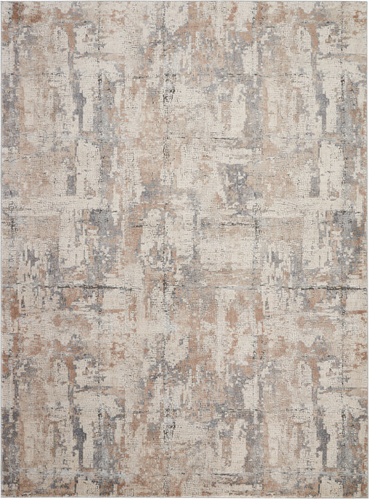 Abstract distressed rug in beige, cream, taupe and gray; modern patchwork design with a soft woven texture.