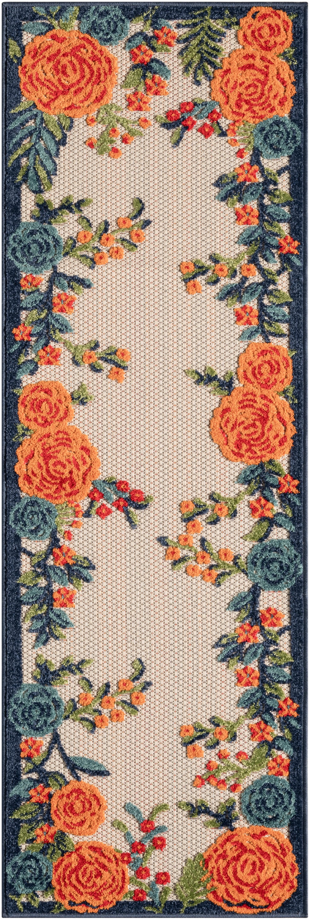 Navy bordered runner rug with bright orange roses, teal blooms and green leaves framing a beige center.