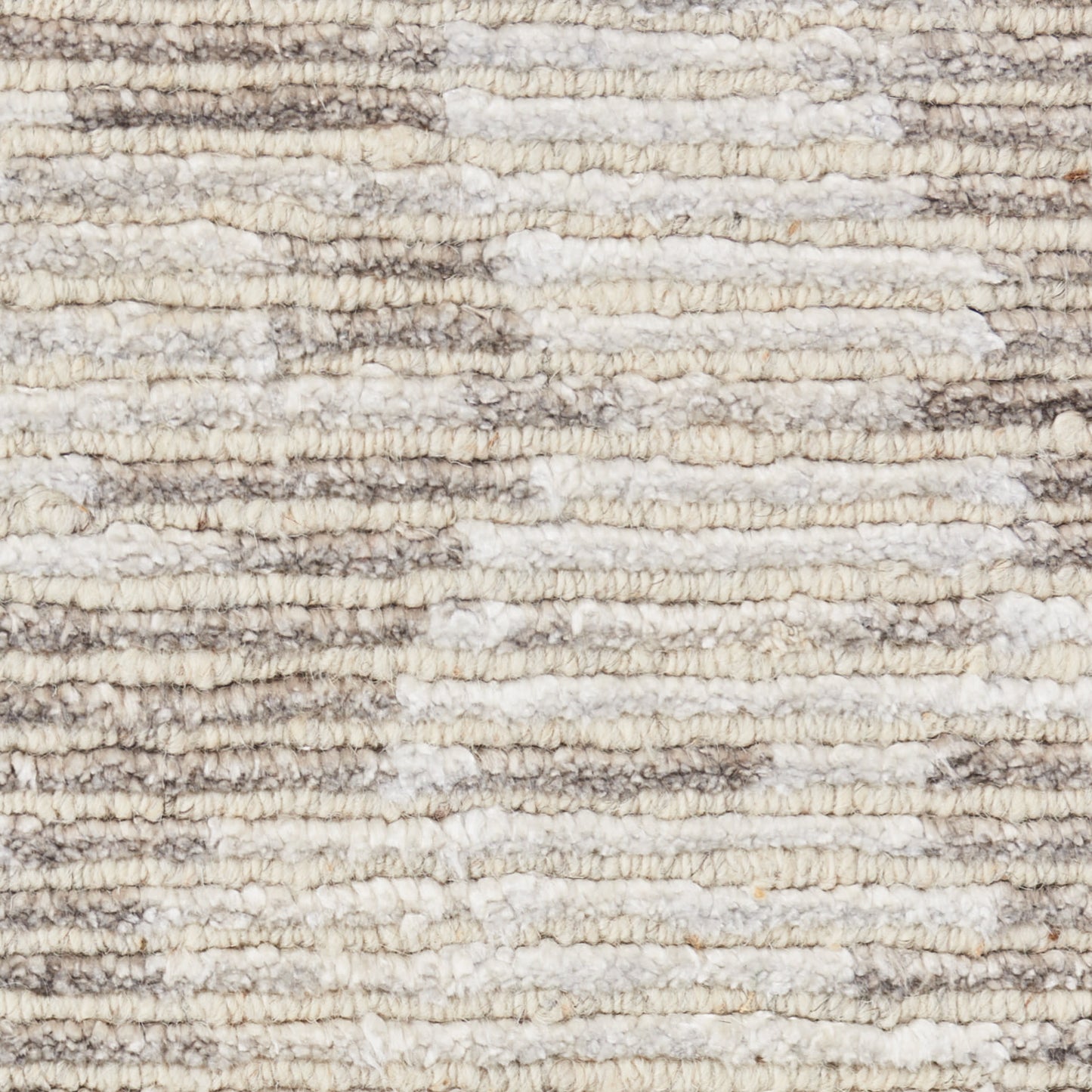 Cream and beige striped shag rug with thick plush pile for cozy modern living rooms.
