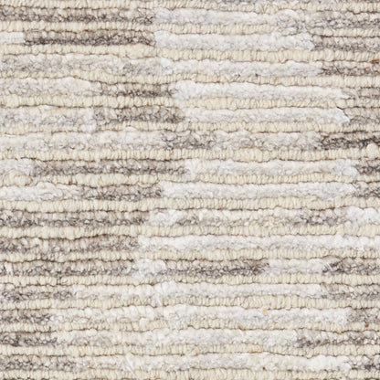 Cream and beige striped shag rug with thick plush pile for cozy modern living rooms.