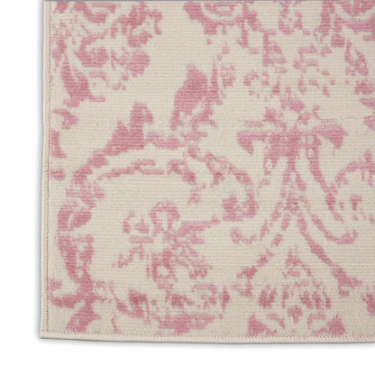 Cream jacquard textile with pink damask pattern; woven 6' long rug runner with stitched hem.
