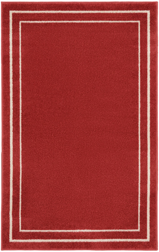 Red plush rectangular rug with two cream border lines forming nested rectangles; modern minimalist decor.