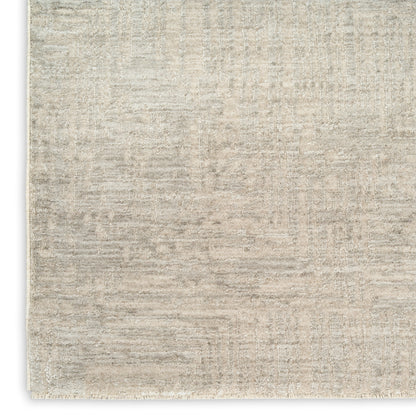 Beige cream textured area rug with subtle mottled pattern; neutral modern style, ideal for living spaces.