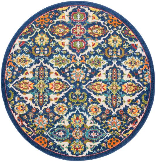Round oriental rug with navy background and bright multicolor floral damask pattern; blue outer border.