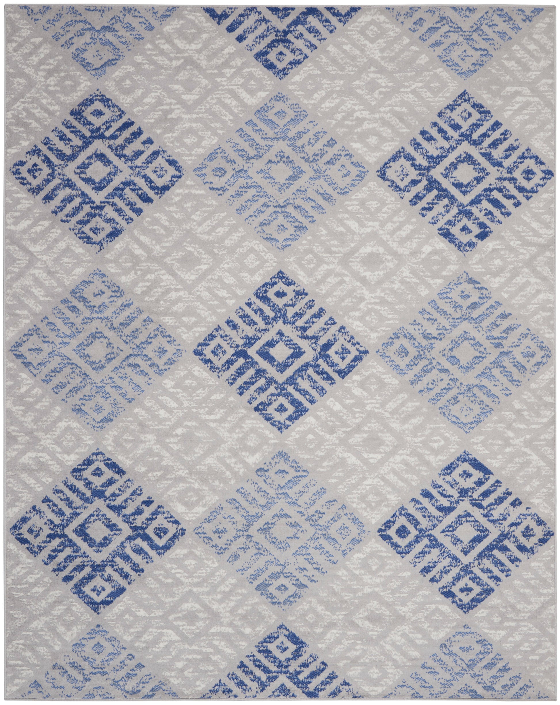 Rectangular rug with blue and light-blue diamond motifs on a light gray background; geometric concentric-squares pattern.