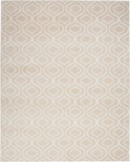 Beige area rug with white geometric arabesque lattice pattern.