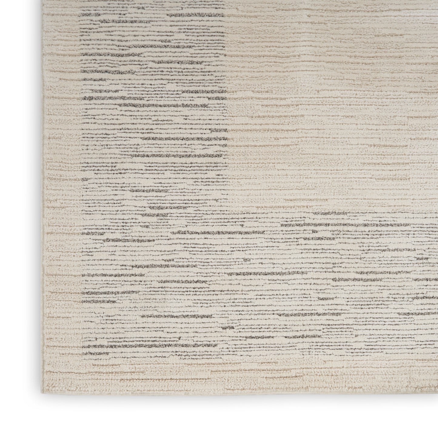 Cream-beige woven rug with subtle gray horizontal brush lines; modern minimalist texture.