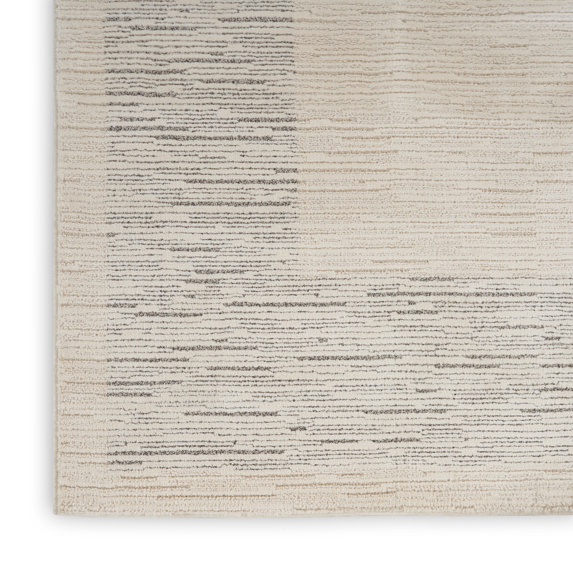Cream-beige woven rug with subtle gray horizontal brush lines; modern minimalist texture.