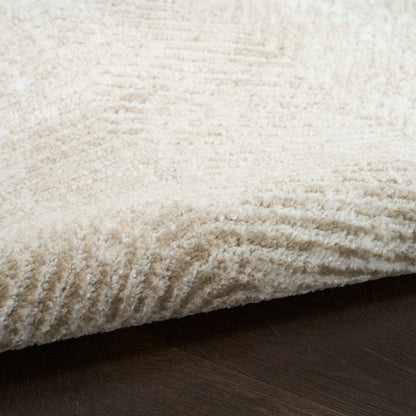 Cream shag rug with thick, plush pile laid on dark wooden floor.