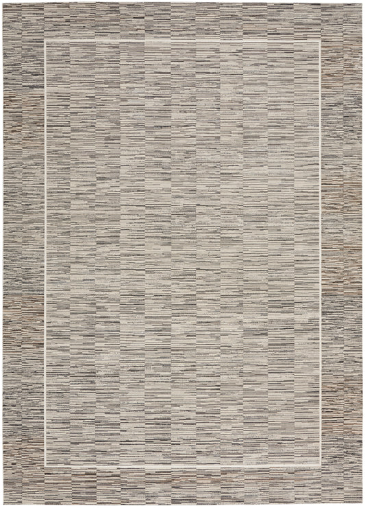 Neutral beige-gray flatweave rug with subtle horizontal texture and white inner frame, modern living room decor