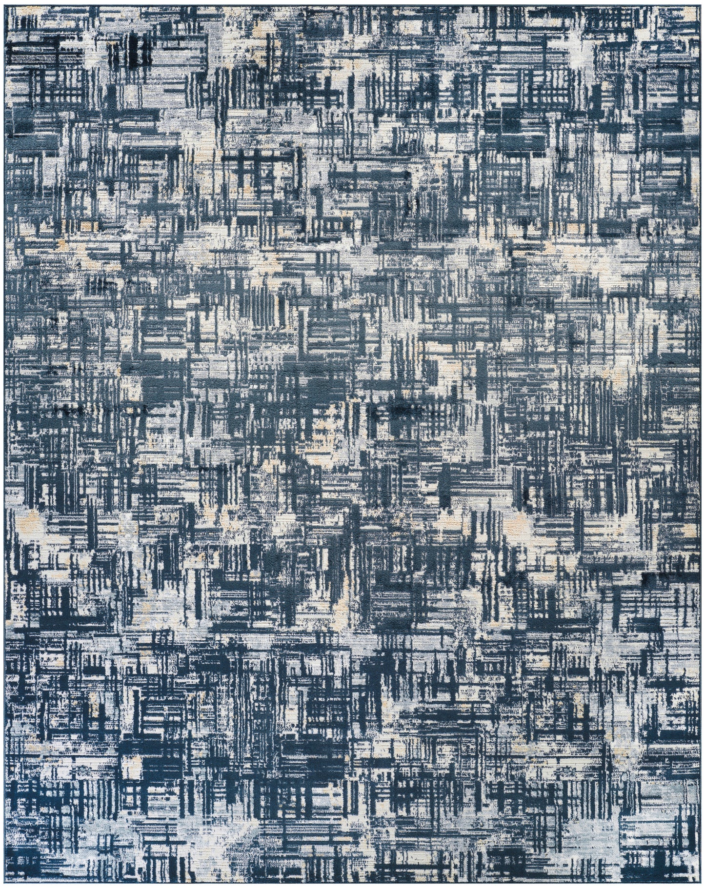 Abstract blue area rug with a distressed geometric pattern in navy, light blue, and cream tones.
