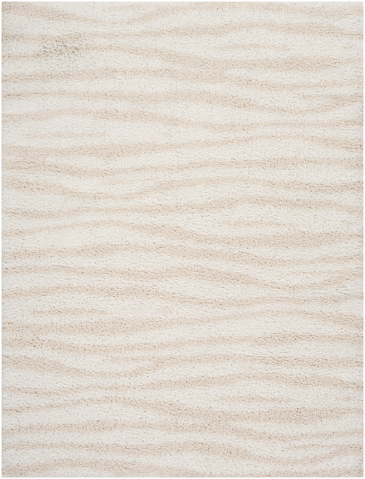 Cream beige shag rug with soft, plush pile and subtle wavy texture.