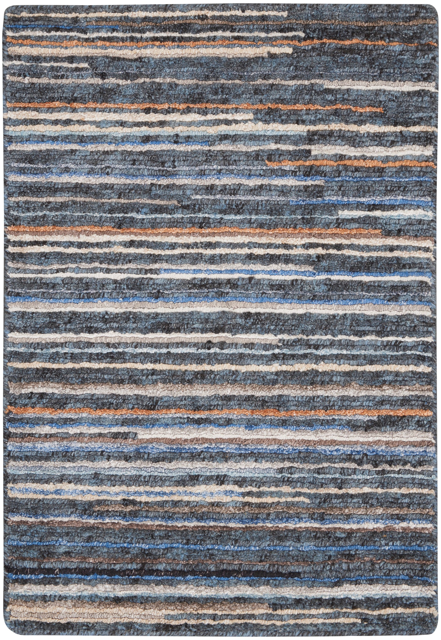 Blue-gray striped shag rug with white and orange accents; soft, thick textured pile.